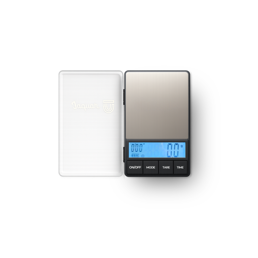 Digital pocket scale turned on, blue lit screen with a clear lid on a white background