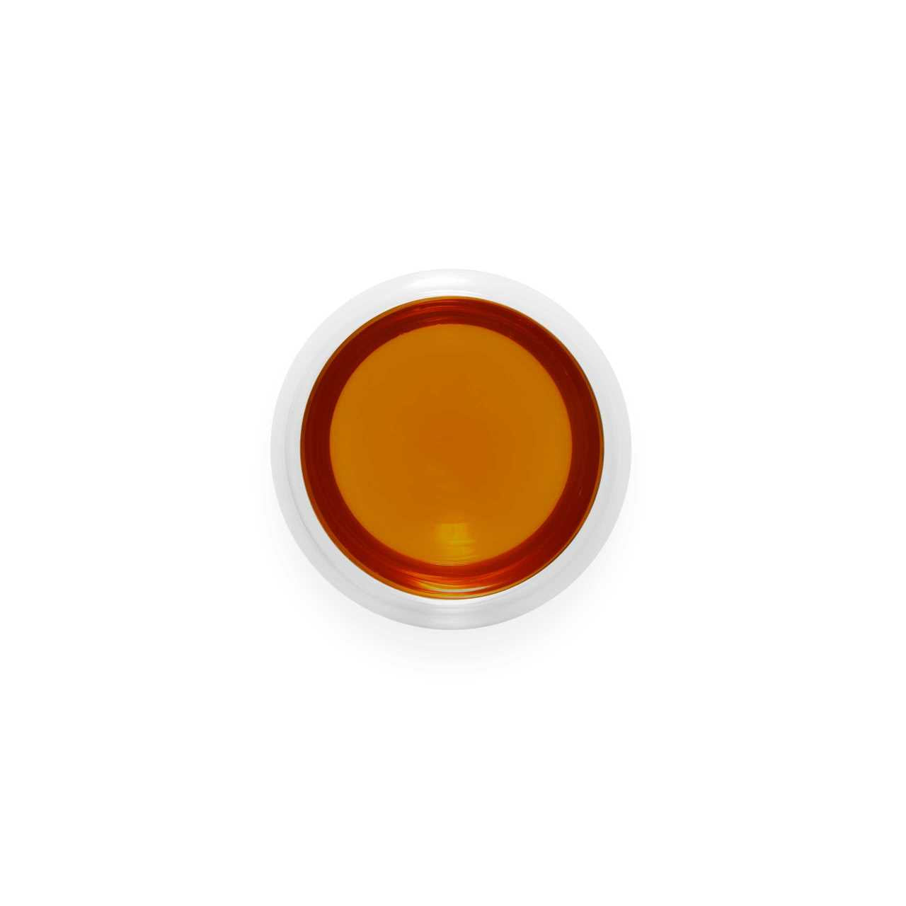 Yunnan Pu-Erh Loose Leaf Tea infusion in a glass cup